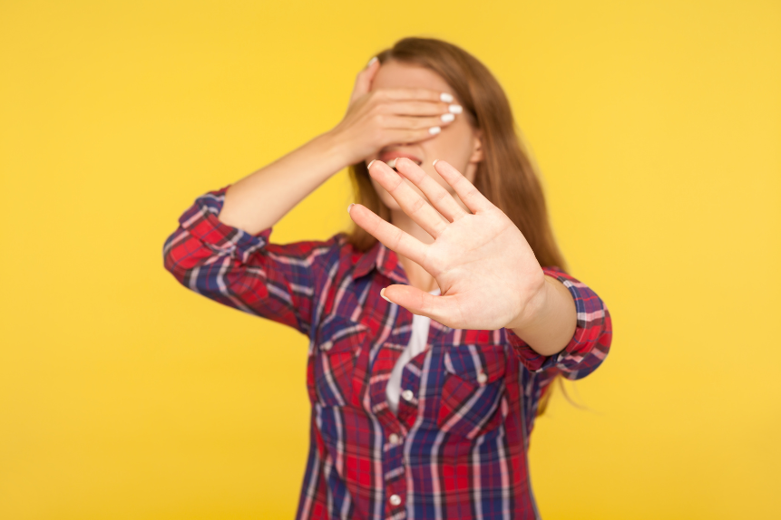 Woman hiding from her phobia